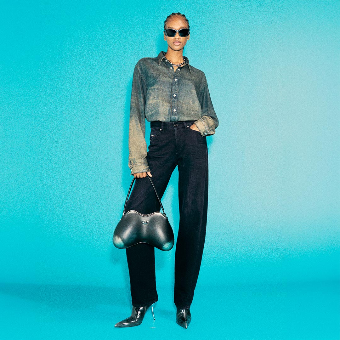 A woman wearing Diesel jeans